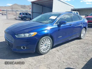 2014 Ford Fusion SE Hybrid with VIN 3FA6P0LUXER220053, listed as a IAAI auction lot 42229079 with 187,199 mi miles and . Bid and sale history available at DreamBid. Image 2.