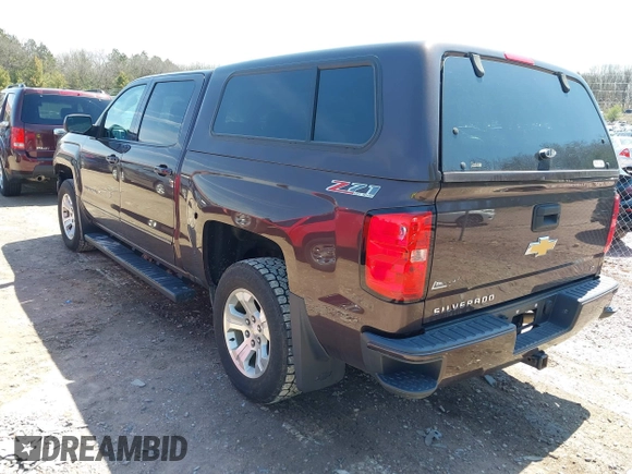 2016 Chevrolet Silverado 1500 LT with VIN 3GCUKREC3GG305792, listed as a IAAI auction lot 42083847 with 72,325 mi miles and . Bid and sale history available at DreamBid. Image 3.