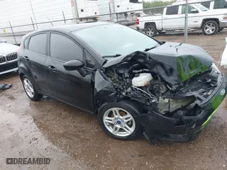 2019 Ford Fiesta SE with VIN 3FADP4EJ3KM165794, listed as a IAAI auction lot 41336199 with NaN miles. Bid and sale history available at carsss.com. Image 1.