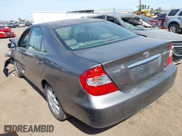2004 Toyota Camry LE with VIN 4T1BF30K24U569209, listed as a IAAI auction lot 41988665 with 191,017 mi miles. Bid and sale history available at carsss.com. Image 3.