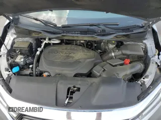 2021 Honda Odyssey Touring z VIN 5FNRL6H85MB039444, wystawiony jako Copart lot #57142205 z przebiegiem 74 228 mil mil oraz Szkoda całkowita • Salvage title. Historia ofert i sprzedaży dostępna na DreamBid. Obrazek 12.