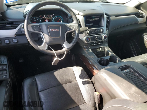 2017 GMC Yukon SLT with VIN 1GKS2BKC9HR345688, listed as a Copart auction lot 52303075 with 122,969 mi miles and Salvage Title. Bid and sale history available at carsss.com. Image 8.