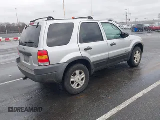 2002 Ford Escape XLT Choice with VIN 1FMYU04192KA82503, listed as a IAAI auction lot 41521335 with 128,349 mi miles. Bid and sale history available at carsss.com. Image 4.