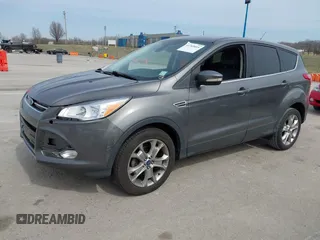 2013 Ford Escape SEL with VIN 1FMCU0HX5DUB82534, listed as a IAAI auction lot 41769014 with 182,433 mi miles. Bid and sale history available at carsss.com. Image 2.