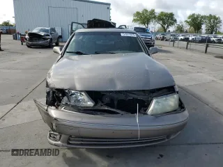 1998 Toyota Avalon XL with VIN 4T1BF18B1WU255028, listed as a Copart auction lot 51017075 with 248,911 mi miles and Salvage Title. Bid and sale history available at DreamBid. Image 5.