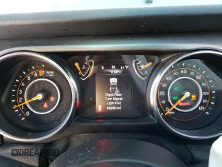 2019 Jeep Wrangler Unlimited Sport with VIN 1C4HJXDG9KW561720, listed as a Copart auction lot 44467445 with 69,290 mi miles and Salvage title. Bid and sale history available at DreamBid. Image 9.
