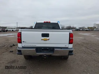 2014 Chevrolet Silverado 1500 LT with VIN 1GCVKREC2EZ390061, listed as a IAAI auction lot 40824477 with 140,928 mi miles and . Bid and sale history available at DreamBid. Image 16.