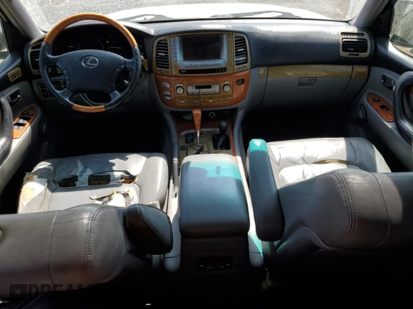 2006 Lexus LX 470 z VIN JTJHT00W264004516, wystawiony jako Copart lot #72607504 z przebiegiem 220 156 mil mil oraz Czysty tytuł • Clean title. Historia ofert i sprzedaży dostępna na DreamBid. Obrazek 8.
