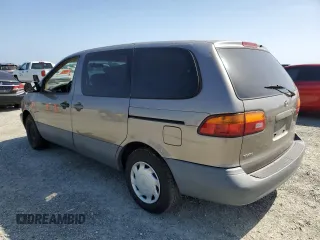 1999 Toyota Sienna CE z VIN 4T3ZF19C4XU163765, wystawiony jako Copart lot #54405805 z przebiegiem Nie podano mil oraz Szkody całkowita. Historia ofert i sprzedaży dostępna na DreamBid. Obrazek 2.