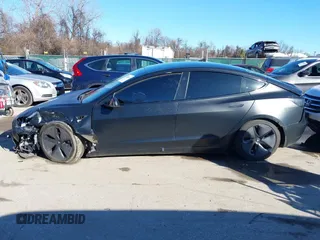 2020 Tesla Model 3 Standard Range Plus with VIN 5YJ3E1EA4LF745491, listed as a IAAI auction lot 41186726 with 74,575 mi miles and . Bid and sale history available at DreamBid. Image 14.
