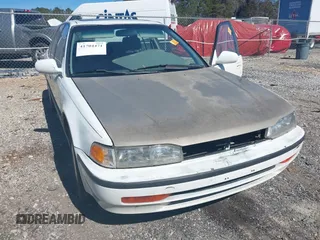 1992 Honda Accord LX with VIN JHMCB7659NC048944, listed as a IAAI auction lot 41704471 with 253,535 mi miles. Bid and sale history available at carsss.com. Image 6.
