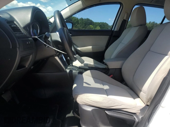 2013 Mazda CX-5 Sport with VIN JM3KE2BE4D0109296, listed as a Copart auction lot 55575555 with 130,112 mi miles and Salvage title. Bid and sale history available at DreamBid. Image 7.
