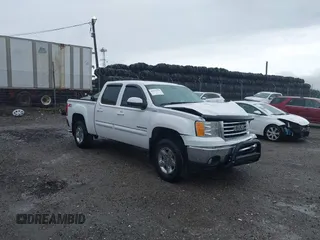 2010 GMC Sierra 1500 SLT with VIN 3GTRKWE33AG148664, listed as a IAAI auction lot 42459596 with 154,739 mi miles and . Bid and sale history available at DreamBid. Image 1.