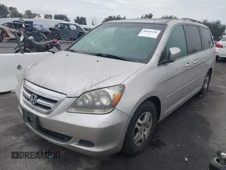 2007 Honda Odyssey EX-L with VIN 5FNRL38647B413026, listed as a IAAI auction lot 41824641 with 221,480 mi miles. Bid and sale history available at carsss.com. Image 2.
