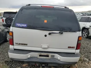 2001 GMC Yukon Denali z VIN 1GKEK63U01J287101, wystawiony jako Copart lot #43659115 z przebiegiem Nie podano mil oraz Szkoda całkowita • Salvage title. Historia ofert i sprzedaży dostępna na DreamBid. Obrazek 6.