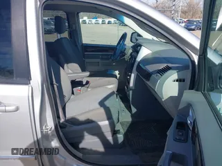 2010 Dodge Grand Caravan SXT with VIN 2D4RN5D19AR406197, listed as a IAAI auction lot 41854505 with 140,760 mi miles and . Bid and sale history available at DreamBid. Image 5.
