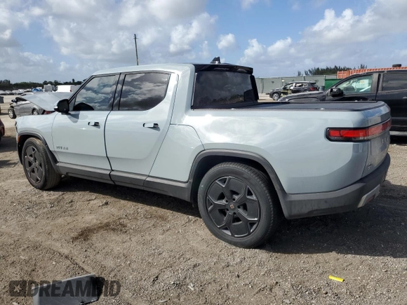 2023 Rivian R1T Adventure with VIN 7FCTGBAA2PN028983, listed as a Copart auction lot 45307015 with 220 mi miles and Salvage Title. Bid and sale history available at DreamBid. Image 2.