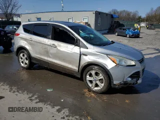 2014 Ford Escape SE with VIN 1FMCU9GX8EUA90860, listed as a Copart auction lot 54197415 with 89,098 mi miles and Salvage Title. Bid and sale history available at DreamBid. Image 4.