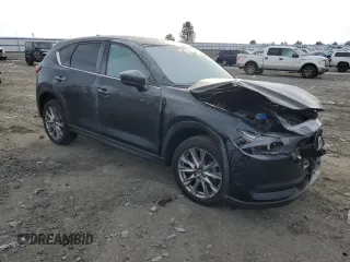 2019 Mazda CX-5 Grand Touring with VIN JM3KFBDM9K1650840, listed as a Copart auction lot 41929185 with 61,814 mi miles and Salvage Title. Bid and sale history available at carsss.com. Image 4.