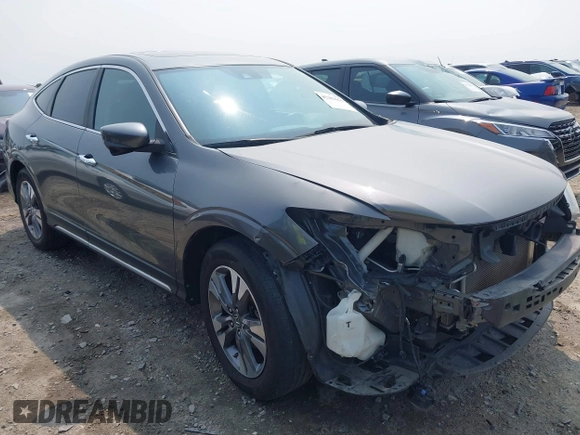 2014 Honda Crosstour EX-L z VIN 5J6TF2H59EL000957, wystawiony jako IAAI lot #42383656 z przebiegiem 116 317 mil mil oraz . Historia ofert i sprzedaży dostępna na DreamBid. Obrazek 1.