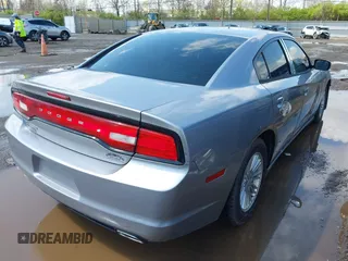 2013 Dodge Charger SE with VIN 2C3CDXBG7DH742812, listed as a IAAI auction lot 41991577 with 124,057 mi miles and . Bid and sale history available at DreamBid. Image 4.