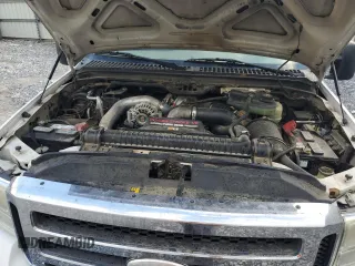2005 Ford F-350 XL с VIN 1FTWW32P55EA54456, выставлен на аукционе Copart как лот 84890534 с пробегом 128 220 миль миль и Списание • Salvage title. История ставок и продаж доступна на DreamBid. Изображение 13.