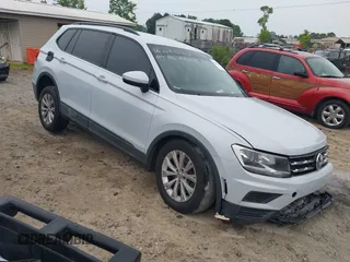2018 Volkswagen Tiguan S with VIN 3VV1B7AX0JM041120, listed as a IAAI auction lot 42219662 with 160,852 mi miles and . Bid and sale history available at DreamBid. Image 1.