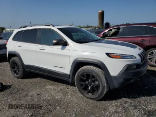 2015 Jeep Cherokee Trailhawk with VIN 1C4PJMBS6FW558653, listed as a Copart auction lot 51066195 with 32,905 mi miles and Salvage Title. Bid and sale history available at carsss.com. Image 4.