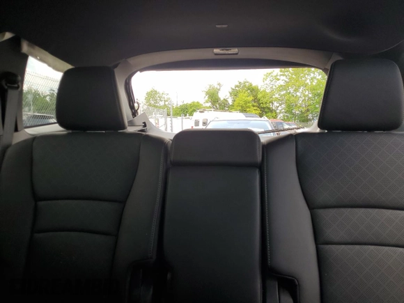 2023 Honda Passport Elite with VIN 5FNYF8H01PB030270, listed as a Copart auction lot 61402965 with 7,931 mi miles and Salvage title. Bid and sale history available at DreamBid. Image 10.