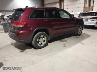 2018 Jeep Grand Cherokee Laredo E with VIN 1C4RJFAG9JC359284, listed as a IAAI auction lot 41032232 with 163,679 mi miles. Bid and sale history available at carsss.com. Image 4.