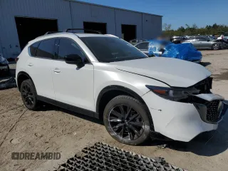 2024 Mazda CX-5 2.5 Carbon Turbo with VIN JM3KFBAY5R0473887, listed as a Copart auction lot 49859265 with 9,220 mi miles and Salvage Title. Bid and sale history available at carsss.com. Image 4.