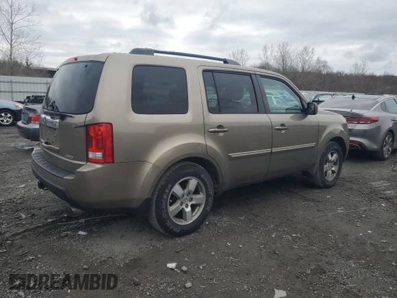 2011 Honda Pilot EX-L with VIN 5FNYF4H64BB022010, listed as a Copart auction lot 52857855 with 169,619 mi miles and Clean Title. Bid and sale history available at carsss.com. Image 3.
