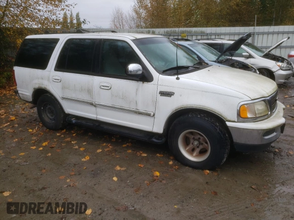 1997 Ford Expedition XLT z VIN 1FMEU17L6VLA61113, wystawiony jako Copart lot #73465703 z przebiegiem 184 878 mil mil oraz Czysty tytuł • Clean title. Historia ofert i sprzedaży dostępna na DreamBid. Obrazek 4.