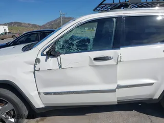 2012 Jeep Grand Cherokee Overland with VIN 1C4RJFCT0CC178071, listed as a IAAI auction lot 41825102 with 125,891 mi miles. Bid and sale history available at carsss.com. Image 6.