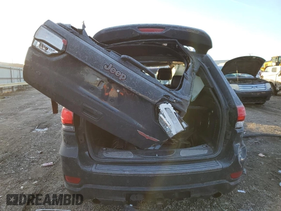 2017 Jeep Grand Cherokee Trailhawk with VIN 1C4RJFLT0HC694583, listed as a Copart auction lot 84421734 with 116,772 mi miles and Salvage title. Bid and sale history available at DreamBid. Image 6.