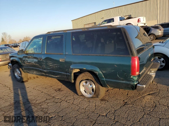 1997 GMC Suburban with VIN 3GKFK16RXVG513571, listed as a Copart auction lot 82086924 with 190,142 mi miles and Salvage title. Bid and sale history available at DreamBid. Image 2.