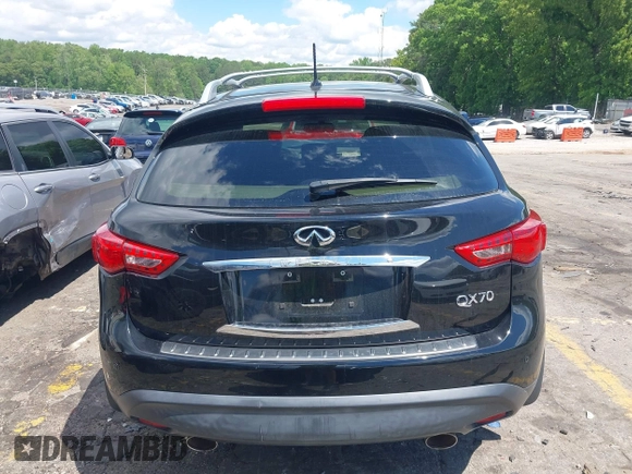 2015 Infiniti QX70 z VIN JN8CS1MW9FM483358, wystawiony jako IAAI lot #42194570 z przebiegiem 86 168 mil mil oraz . Historia ofert i sprzedaży dostępna na DreamBid. Obrazek 16.