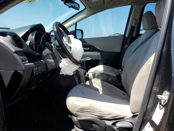 2015 Mazda 5 Touring with VIN JM1CW2CL2F0188459, listed as a Copart auction lot 67553274 with 185,581 mi miles and Salvage Title. Bid and sale history available at DreamBid. Image 7.