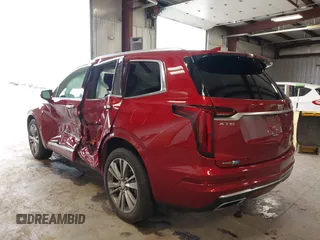 2020 Cadillac XT6 AWD Premium Luxury with VIN 1GYKPDRS0LZ215534, listed as a IAAI auction lot 42299906 with 23,004 mi miles and . Bid and sale history available at DreamBid. Image 3.