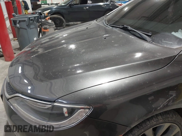 2015 Chrysler 200 C with VIN 1C3CCCCG1FN551259, listed as a IAAI auction lot 41221979 with 98,055 mi miles and . Bid and sale history available at carsss.com. Image 6.