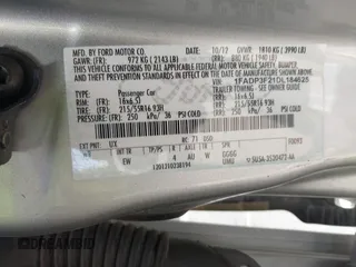 2013 Ford Focus SE with VIN 1FADP3F21DL184625, listed as a IAAI auction lot 42575194 with 113,601 mi miles and . Bid and sale history available at DreamBid. Image 9.