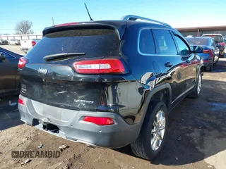 2014 Jeep Cherokee Limited with VIN 1C4PJMDS6EW190972, listed as a IAAI auction lot 41672533 with 213,228 mi miles and . Bid and sale history available at DreamBid. Image 4.
