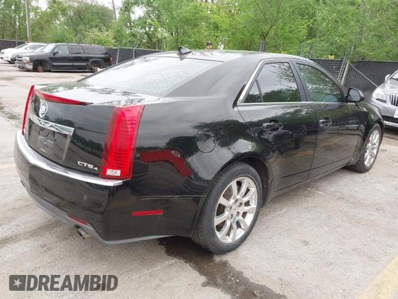 2009 Cadillac CTS AWD w/1SB with VIN 1G6DT57V290165006, listed as a IAAI auction lot 42144947 with 162,969 mi miles. Bid and sale history available at carsss.com. Image 4.