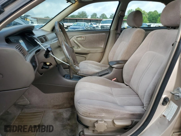 1997 Toyota Camry LE z VIN 4T1BG22K6VU815524, wystawiony jako Copart lot #57466415 z przebiegiem Nie podano mil oraz Szkoda całkowita • Salvage title. Historia ofert i sprzedaży dostępna na DreamBid. Obrazek 7.
