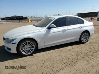2013 BMW 3 Series 328i xDrive with VIN WBA3B3C51DF532714, listed as a Copart auction lot 57854735 with 140,650 mi miles and Salvage title. Bid and sale history available at DreamBid. Image 1.
