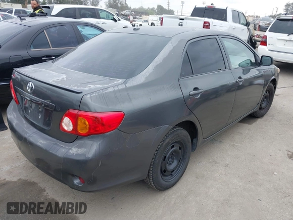 2009 Toyota Corolla with VIN 1NXBU40E49Z165082, listed as a IAAI auction lot 41881134 with 261,282 mi miles. Bid and sale history available at carsss.com. Image 4.