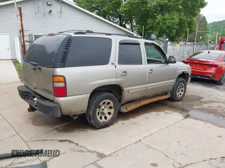 2001 Chevrolet Tahoe LT z VIN 1GNEK13T01R128643, wystawiony jako IAAI lot #42286231 z przebiegiem 186 852 mil mil oraz . Historia ofert i sprzedaży dostępna na DreamBid. Obrazek 4.