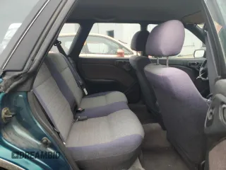 1996 Subaru Legacy Outback with VIN 4S3BG685XT7984194, listed as a Copart auction lot 77999224 with 130,804 mi miles and Salvage title. Bid and sale history available at DreamBid. Image 11.