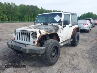 2012 Jeep Wrangler Sport with VIN 1C4AJWAG4CL214606, listed as a IAAI auction lot 42054857 with Not provided miles and . Bid and sale history available at DreamBid. Image 2.
