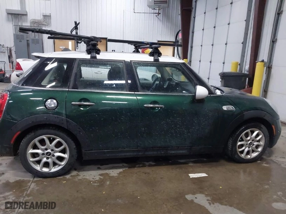 2015 MINI Cooper Hardtop 4 Door S with VIN WMWXU3C55FT892293, listed as a IAAI auction lot 41359066 with 112,704 mi miles. Bid and sale history available at carsss.com. Image 13.